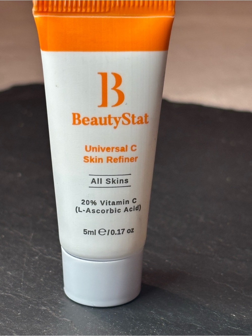 BeautyStat Orange and White Universal C Skin Refiner Travel Tube
